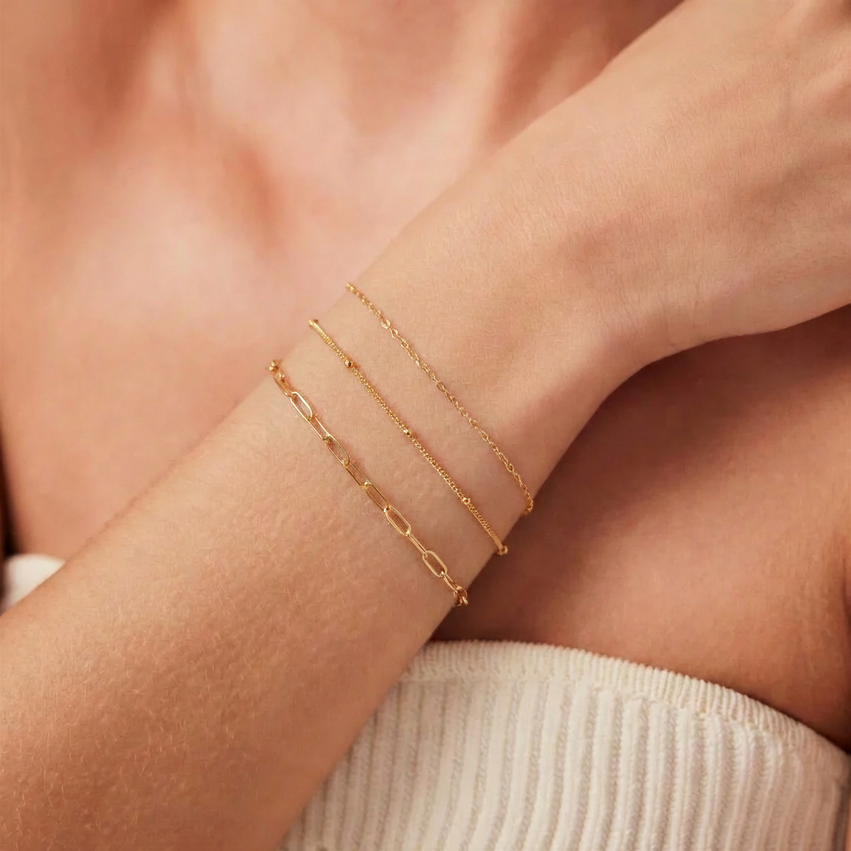 Permanent jewelry Montreal — welded gold filled paperclip chain bracelet at Prysm studio